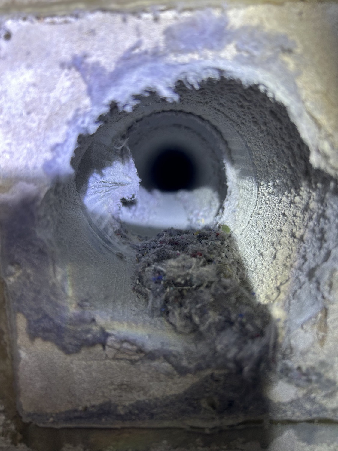 Dryer vent packed with lint