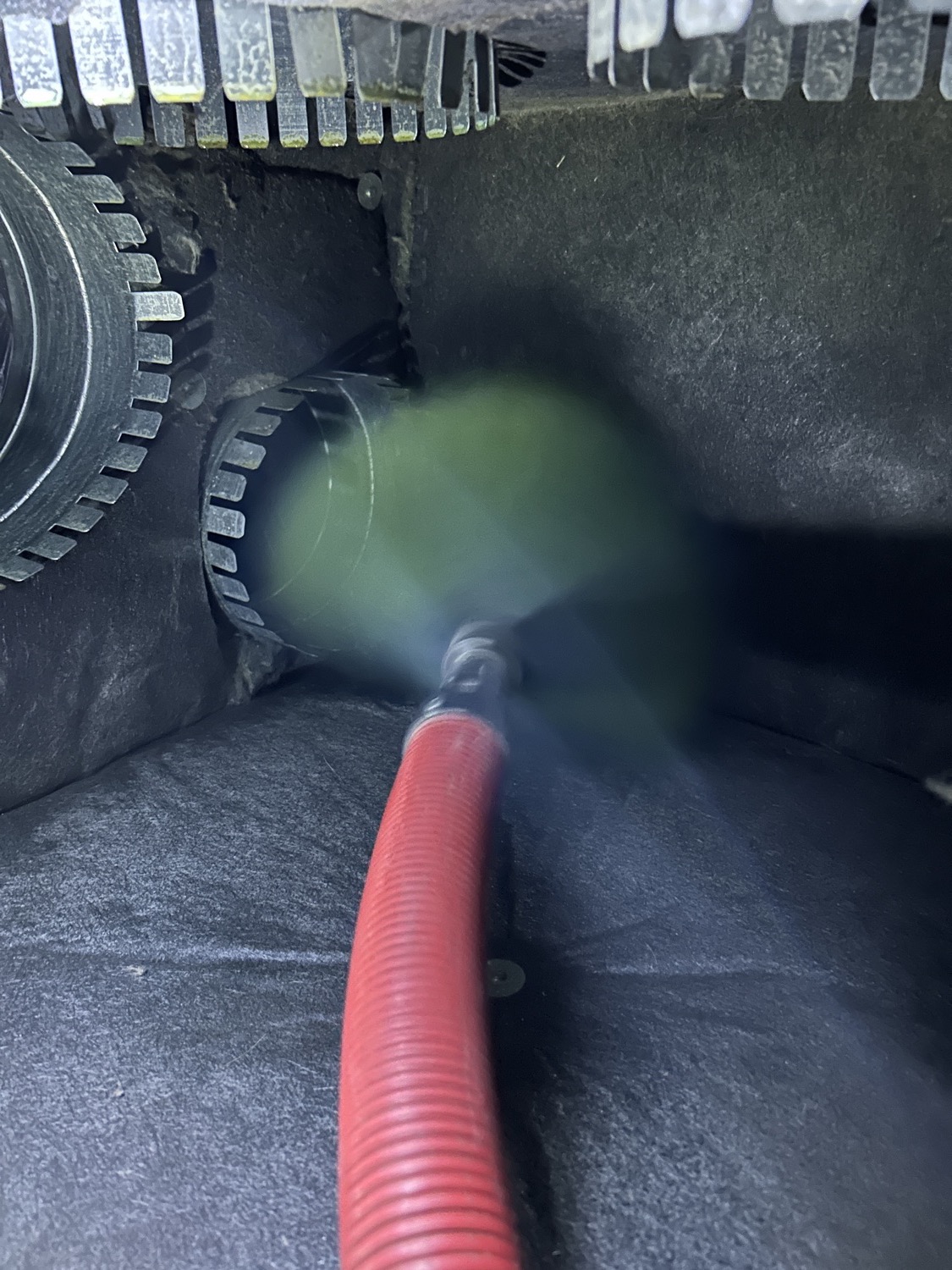 Rotobrush agitating brush cleaning a duct